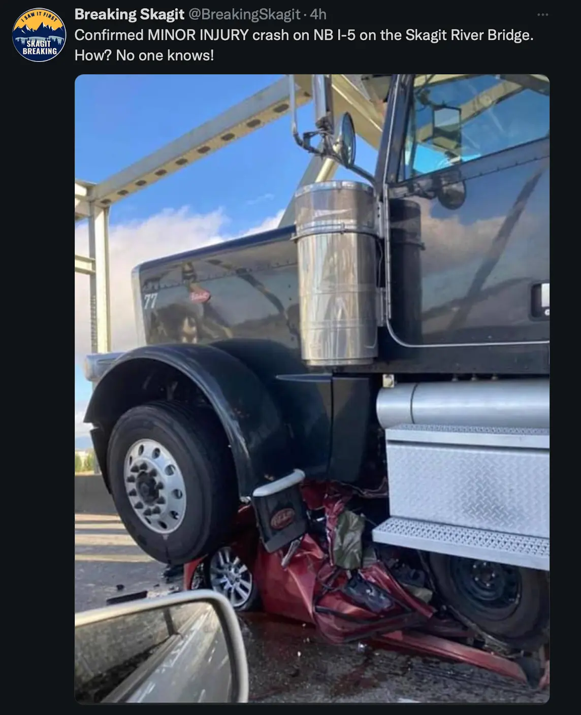 Photo of Semi atop a Nissan Altima